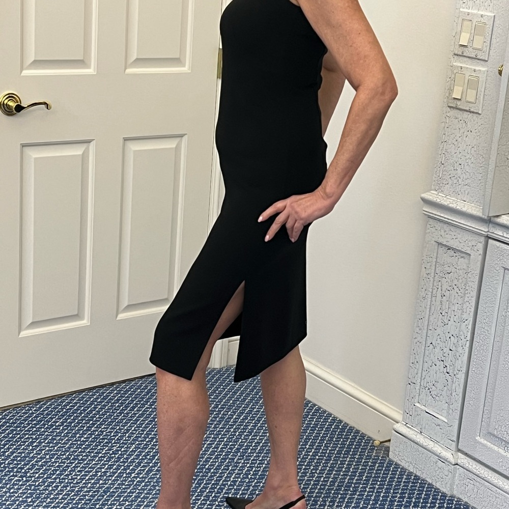 Elegant Black Sleeveless Dress with Jacket